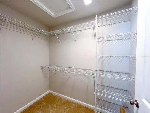 a view of a room with racks on the wall