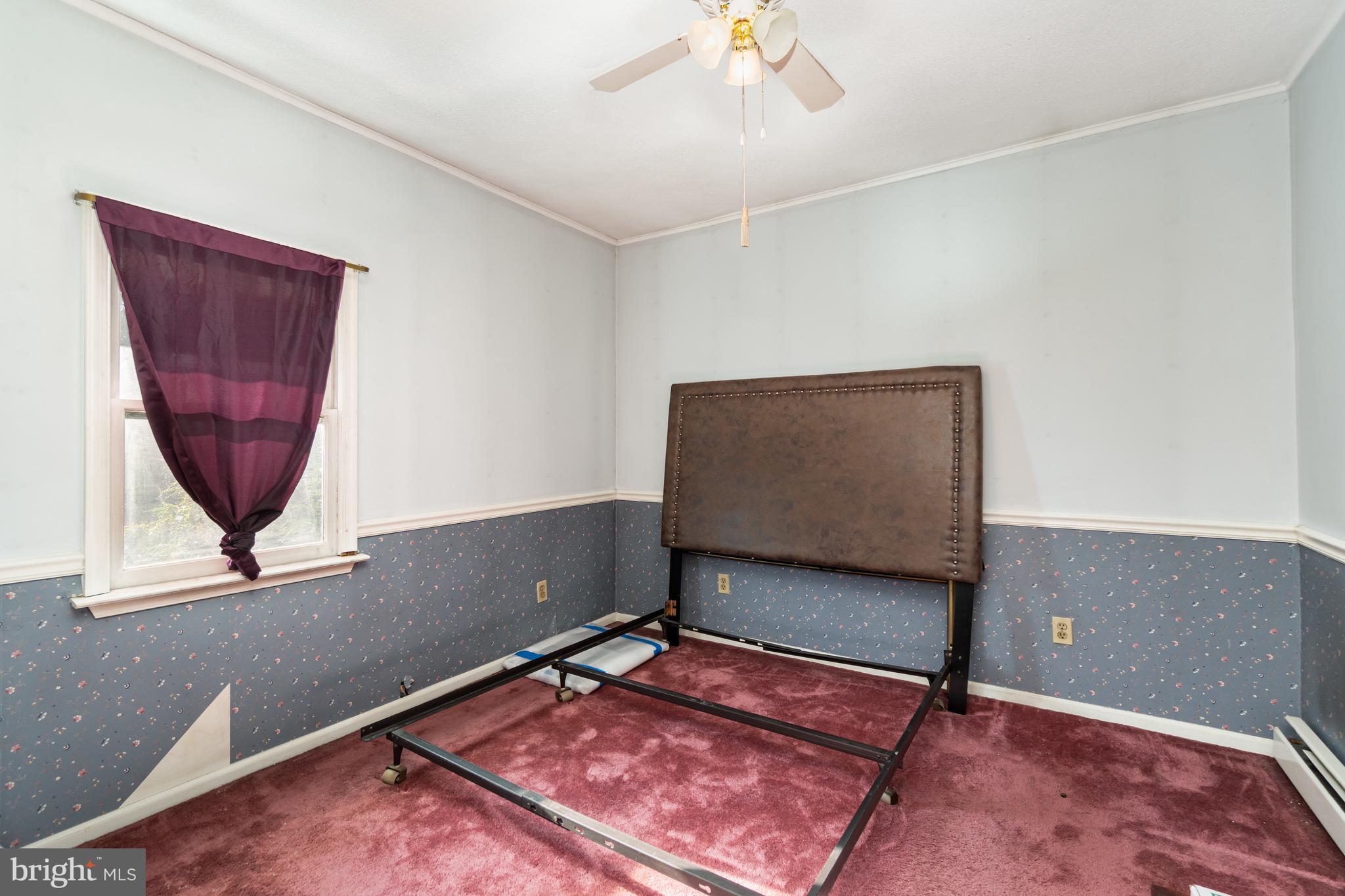 162 Swatara Road Shenandoah, PA 17976 - Photo 18 of 37 a living room with a rug and a window