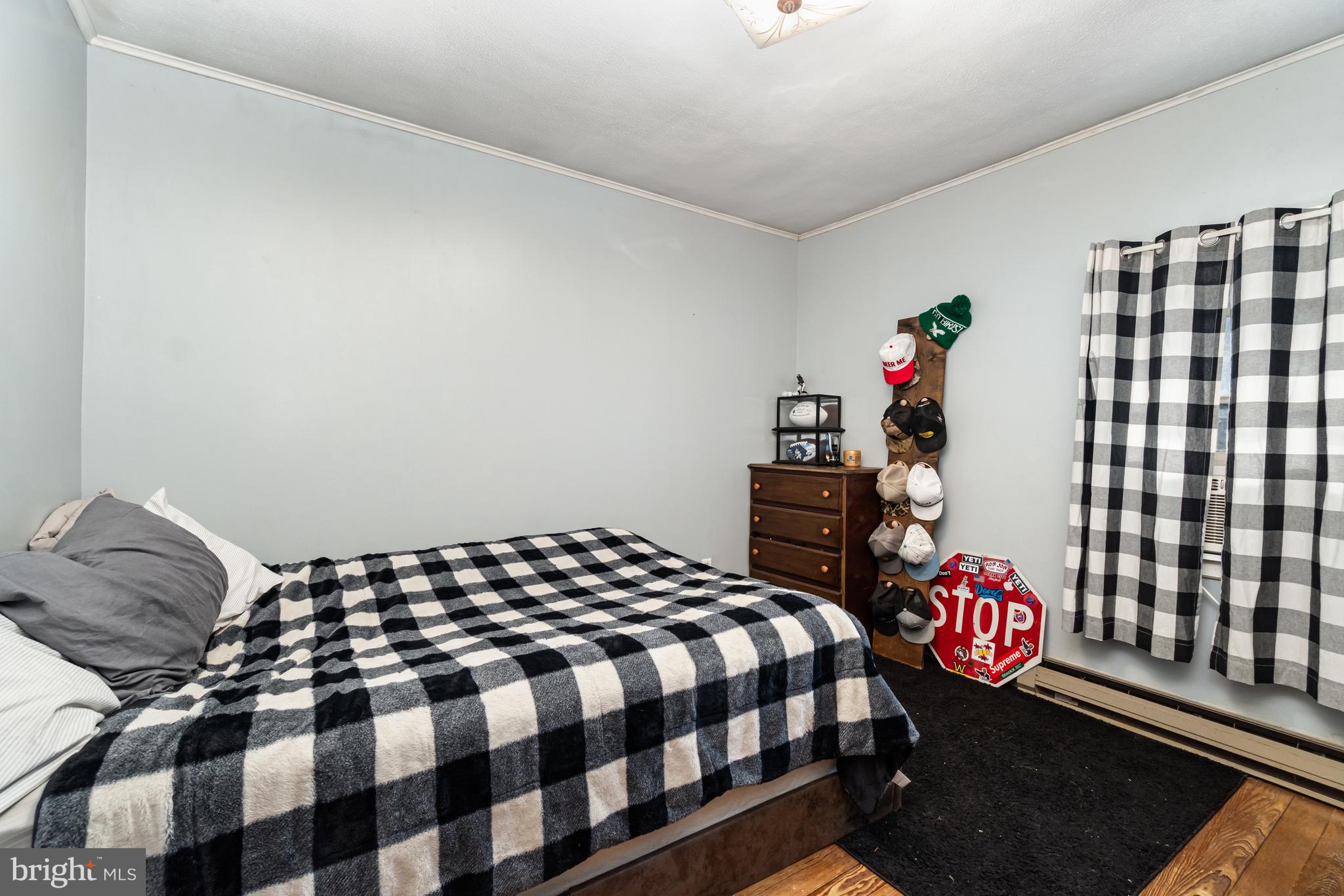 162 Swatara Road Shenandoah, PA 17976 - Photo 19 of 37 a bedroom with a bed and a window