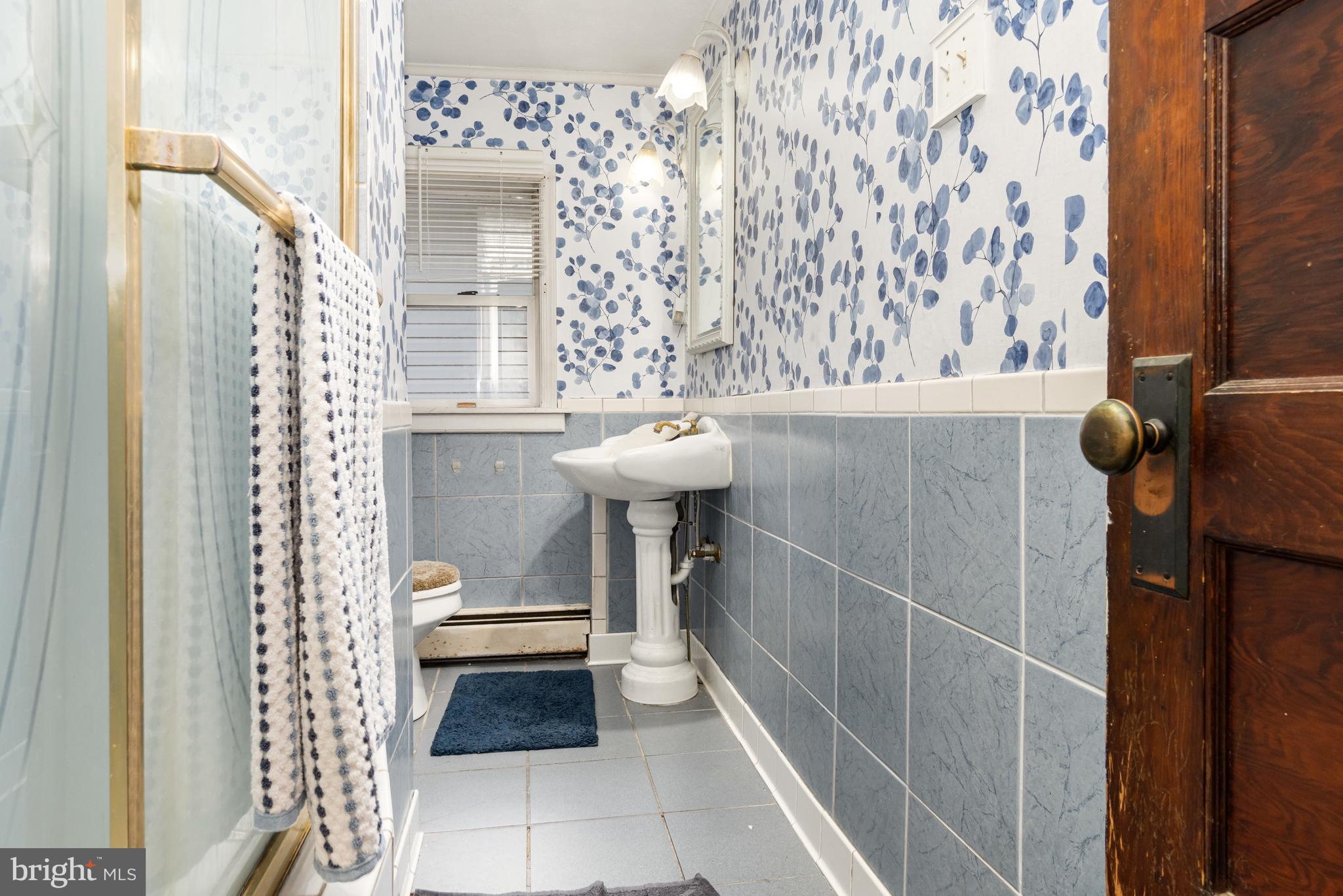 162 Swatara Road Shenandoah, PA 17976 - Photo 21 of 37 a bathroom with a sink and a toilet