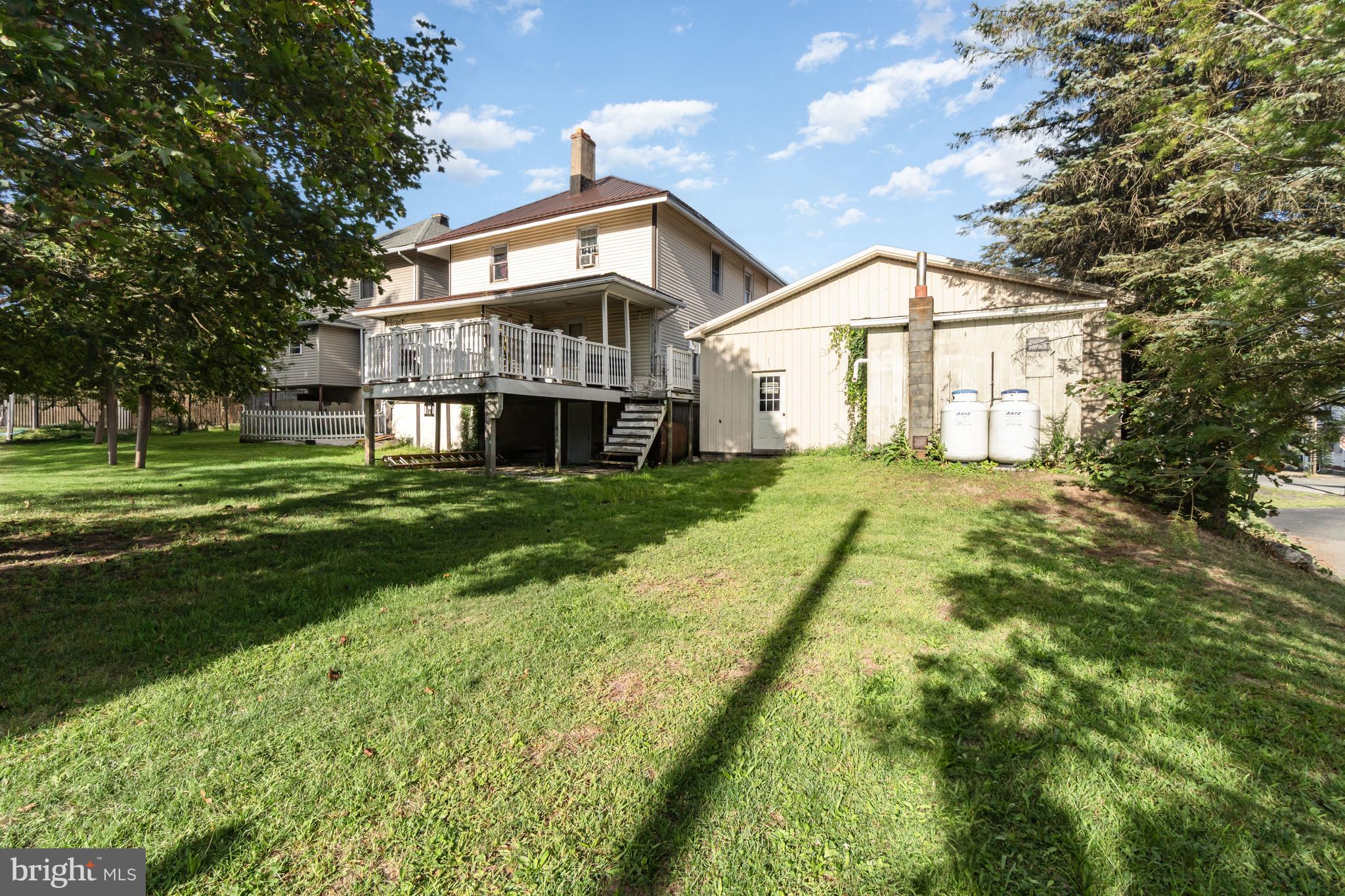 162 Swatara Road Shenandoah, PA 17976 - Photo 27 of 37 a view of house with a big yard and large trees