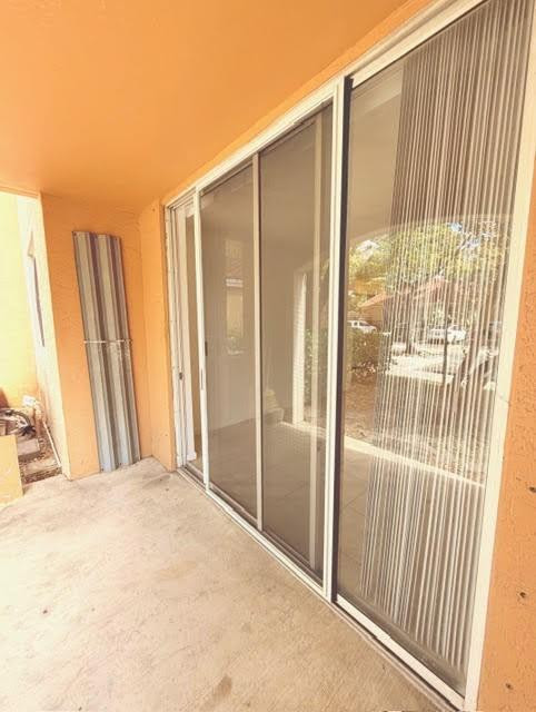 2011 Renaissance Boulevard, Unit 103 Miramar, FL 33025 - Photo 18 of 25 a view of a room with a large window