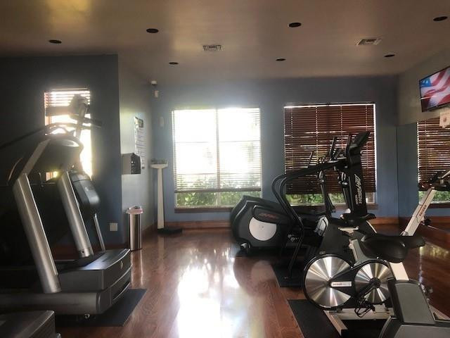 2011 Renaissance Boulevard, Unit 103 Miramar, FL 33025 - Photo 21 of 25 a view of a livingroom with furniture and a large window