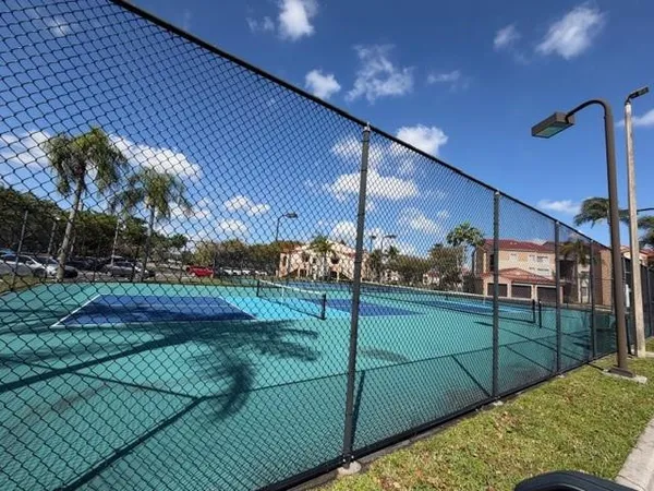 a view of a yard and an trees