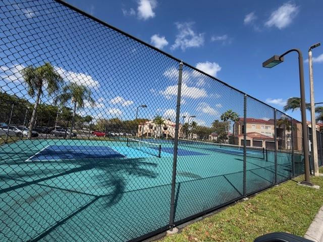 2011 Renaissance Boulevard, Unit 103 Miramar, FL 33025 - Photo 23 of 25 a view of a backyard