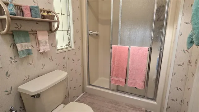 a bathroom with a sink and toilet