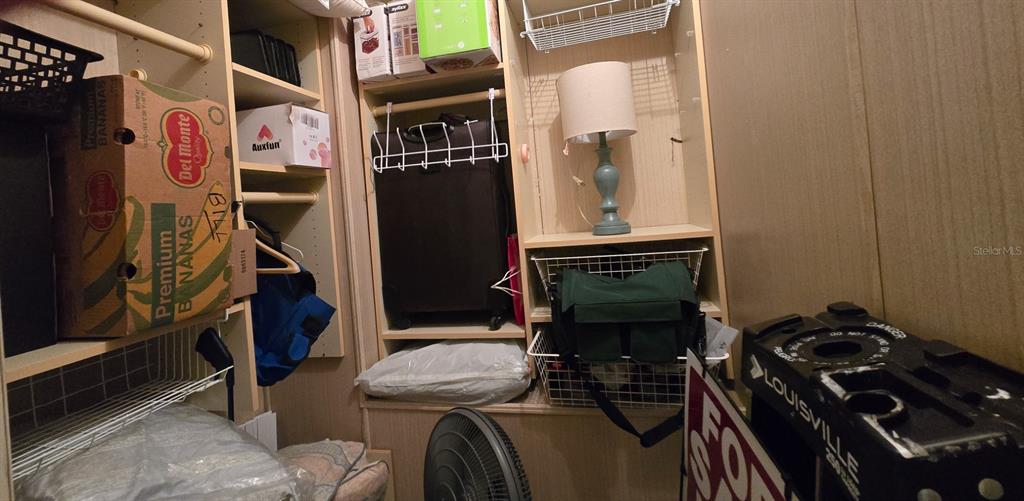 927 Yew Street Sebastian, FL 32976 - Photo 28 of 49 a room with furniture and wooden floor