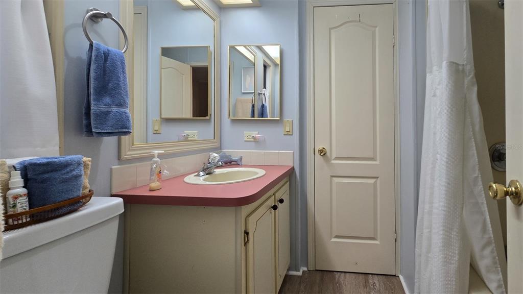927 Yew Street Sebastian, FL 32976 - Photo 29 of 49 a bathroom with a sink and a mirror