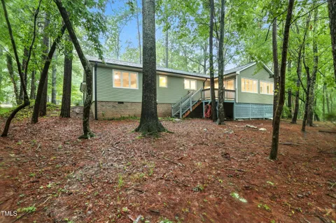 a backyard of a house with lots of green space