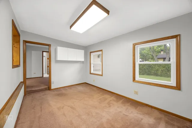 an empty room with windows