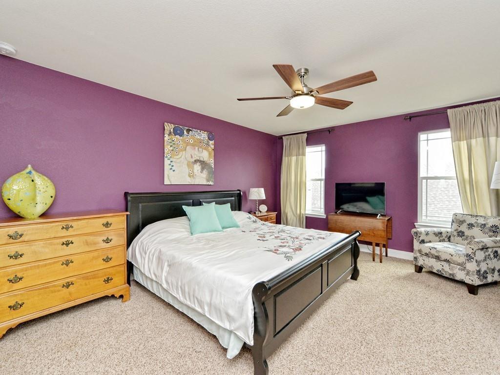 1067 Toltec Trail Georgetown, TX 78626 - Photo 22 of 30 Bedroom featuring carpet flooring and ceiling fan