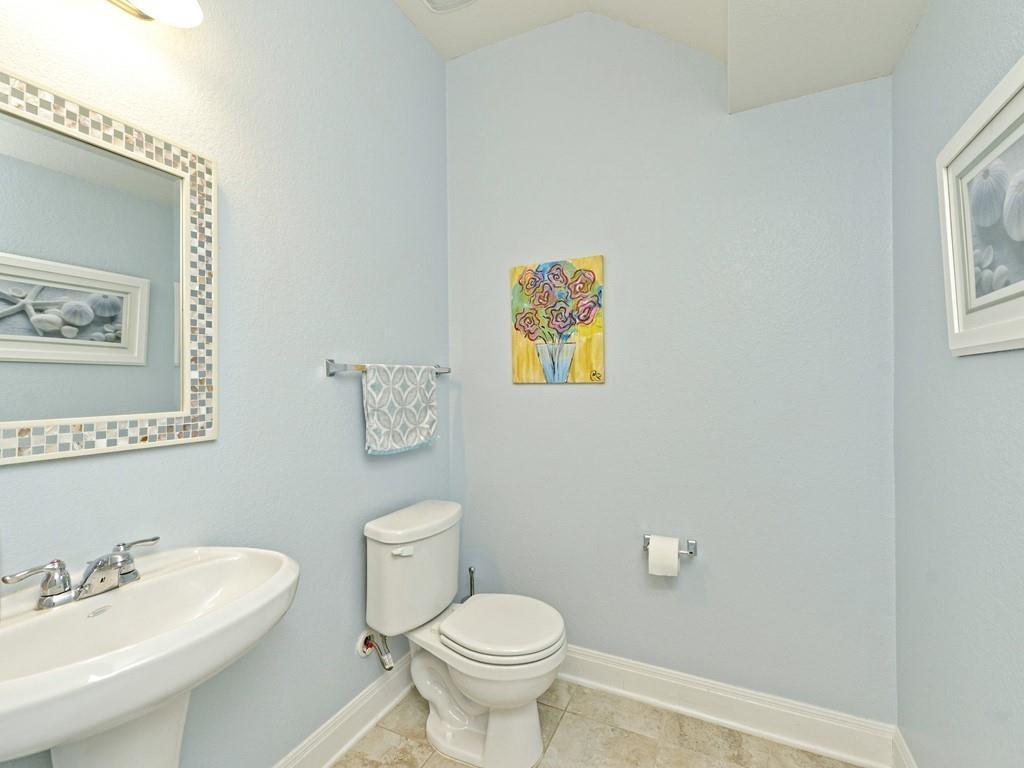 1067 Toltec Trail Georgetown, TX 78626 - Photo 24 of 30 Bathroom featuring baseboards and tile patterned floors