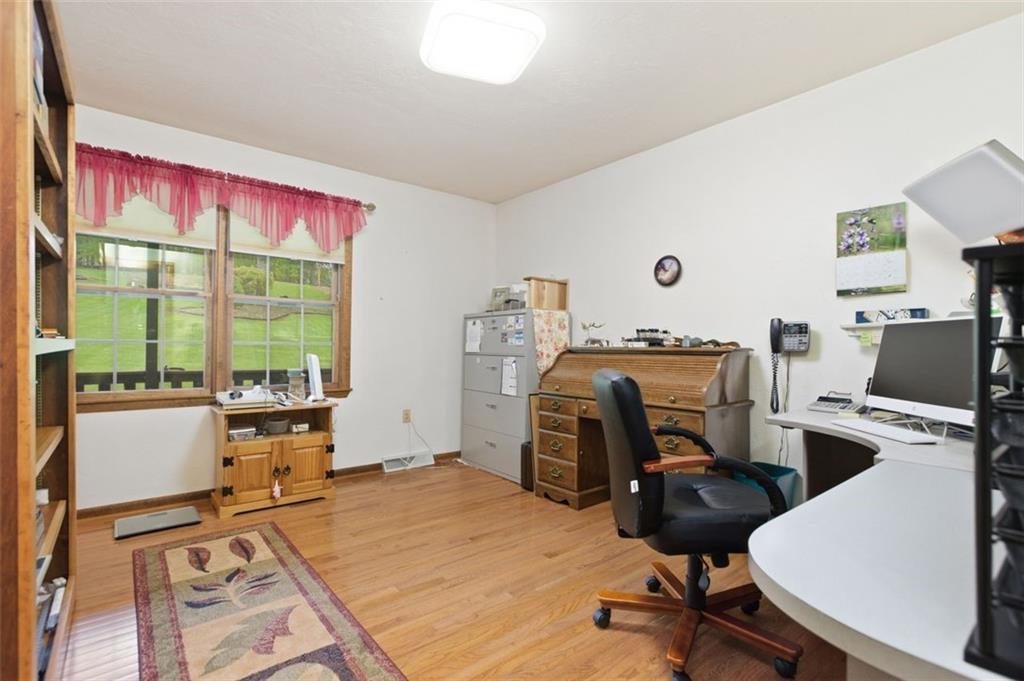 873 Linden Road Eighty Four, PA 15330 - Photo 25 of 40 a bedroom with a bed a desk and chair with the floor to ceiling window