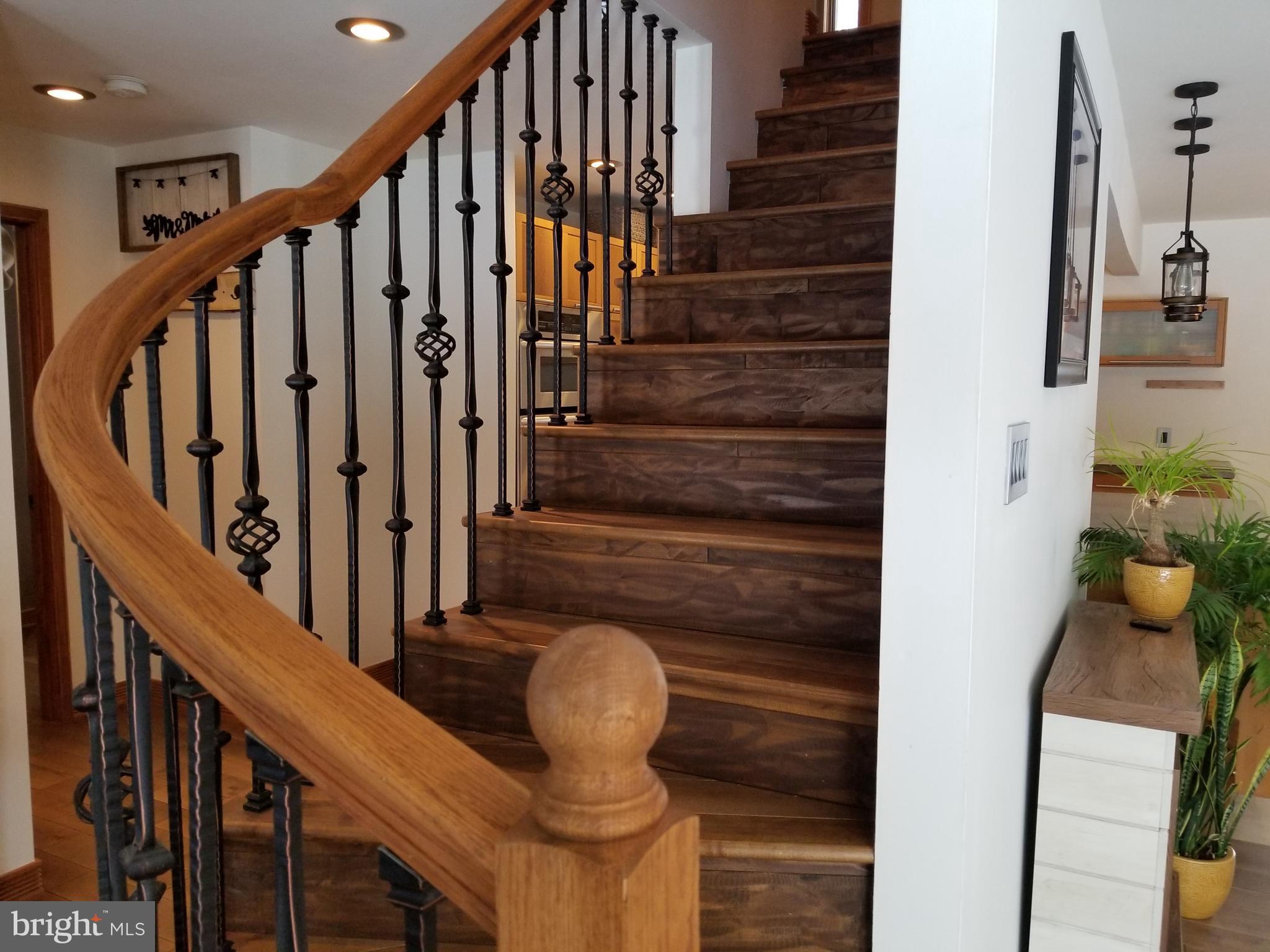 34 Bunker Hill Road Shamong, NJ 08088 - Photo 5 of 34 Staircase with wrought iron balusters