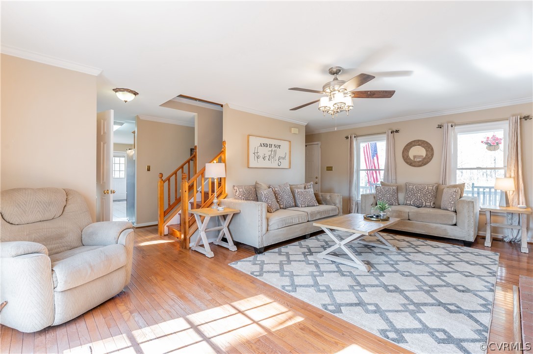 7607 Genuine Risk Lane Midlothian, VA 23112 - Photo 14 of 48 a living room with furniture and a large window