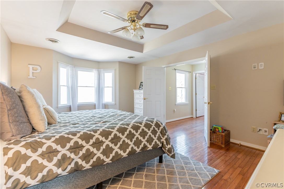 7607 Genuine Risk Lane Midlothian, VA 23112 - Photo 28 of 48 a bedroom with a bed and window