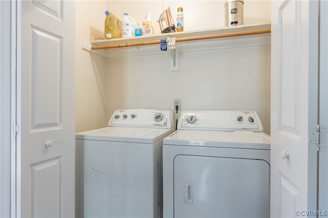 7607 Genuine Risk Lane Midlothian, VA 23112 - Photo 36 of 48 a utility room with dryer and washer