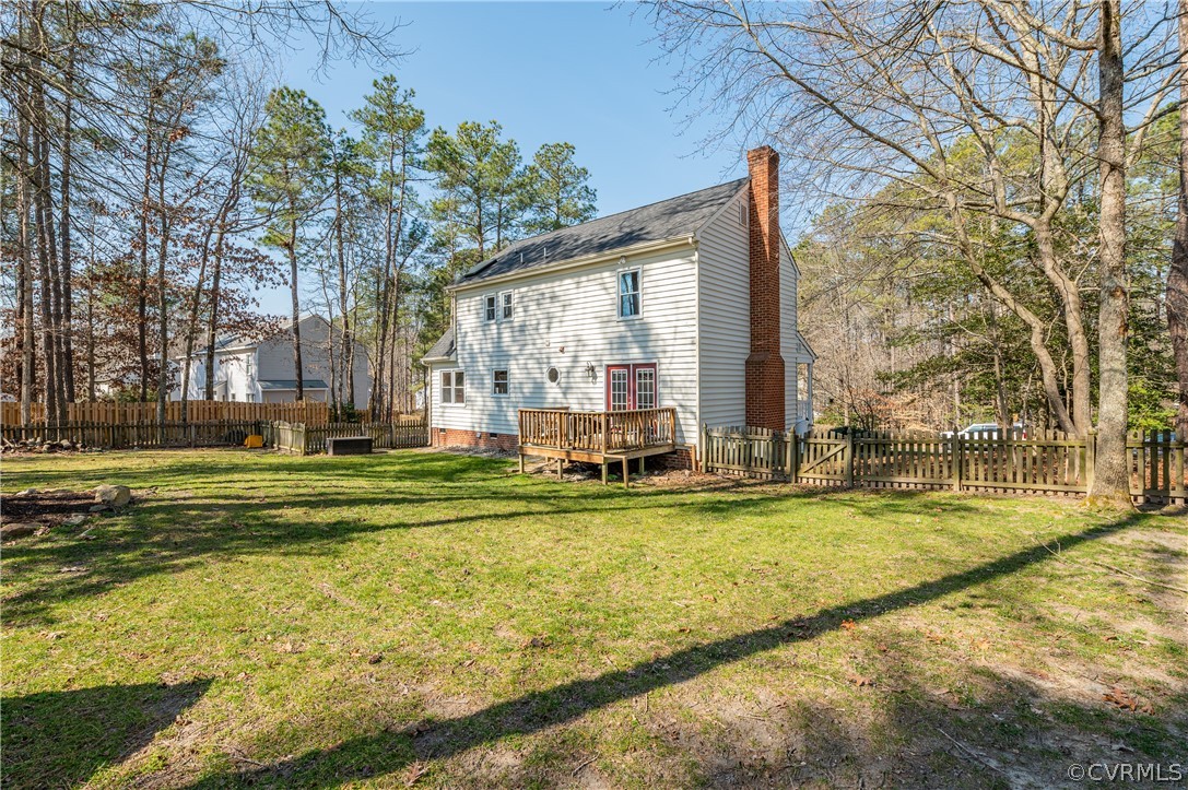 7607 Genuine Risk Lane Midlothian, VA 23112 - Photo 44 of 48 a view of swimming pool with outdoor seating and yard in the back