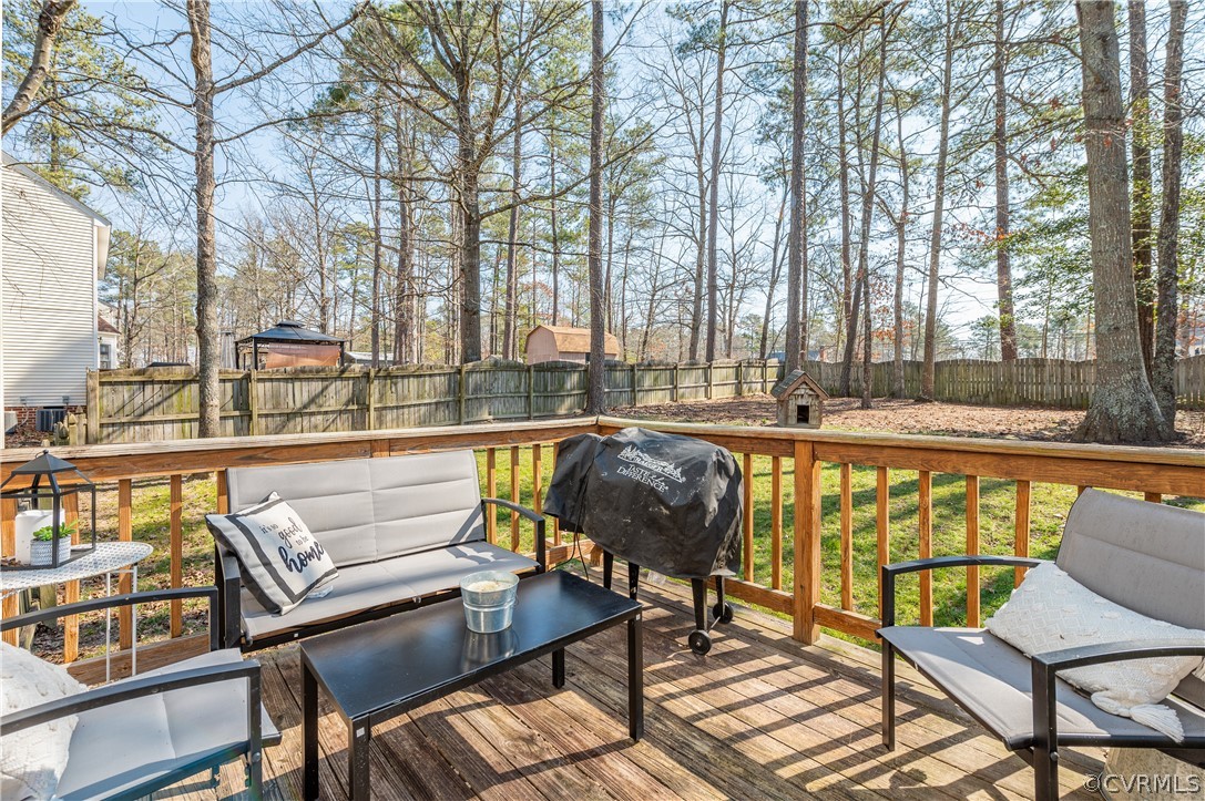 7607 Genuine Risk Lane Midlothian, VA 23112 - Photo 47 of 48 a view of a swimming pool with chairs and tables
