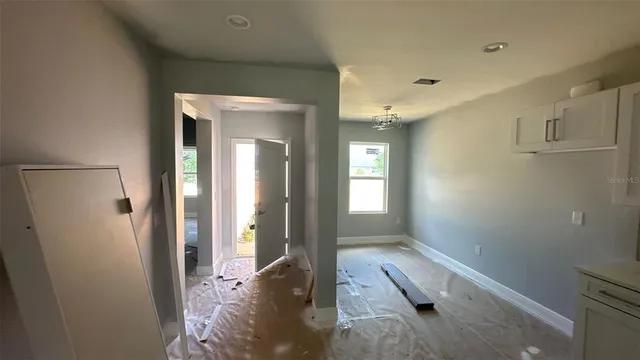 a view of entryway with livingroom