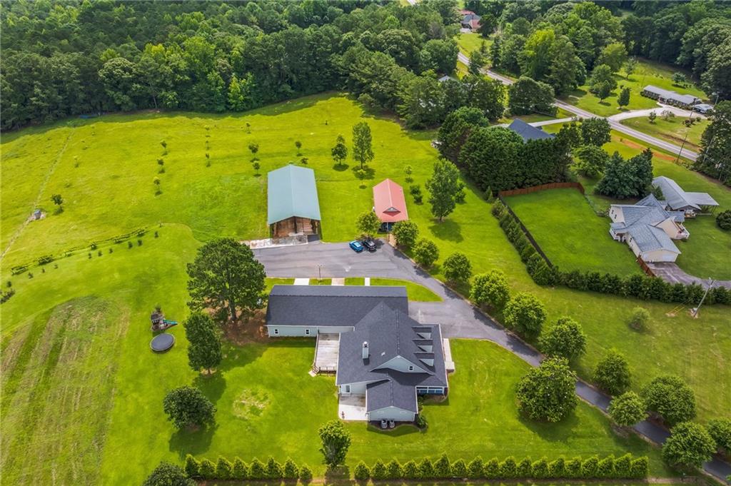 500 Coleman Mill Road Carrollton, GA 30116 - Photo 57 of 83 an aerial view of residential house with outdoor space and swimming pool