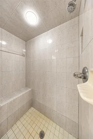 a view of an empty room with a large window