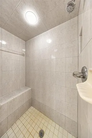 a view of an empty room with a large window