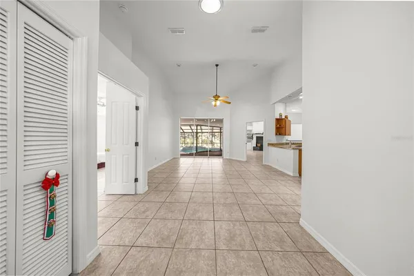 a view of a kitchen with a sink and a window