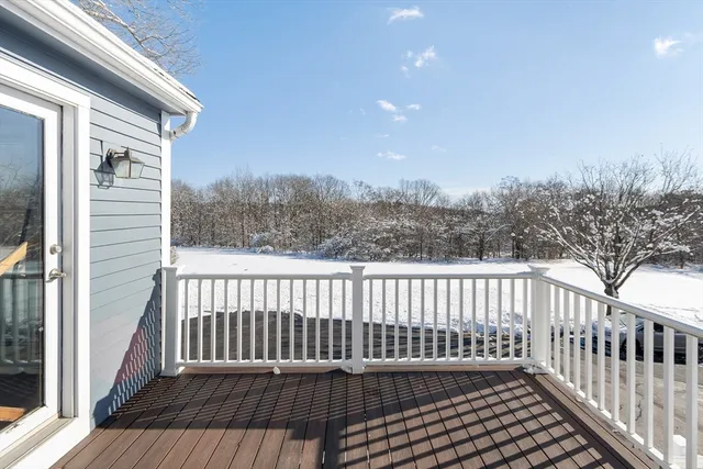 a view of a wooden roof deck