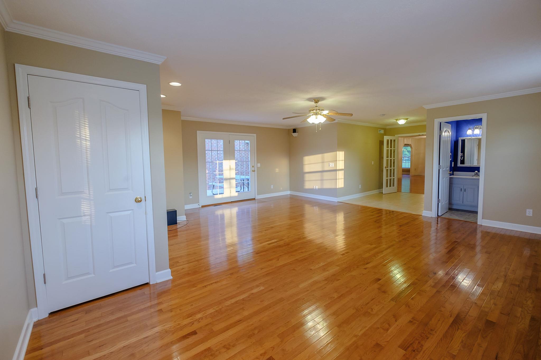 959 Wayside Road Manchester, TN 37355 - Photo 16 of 30 a view of empty room with wooden floor and fan