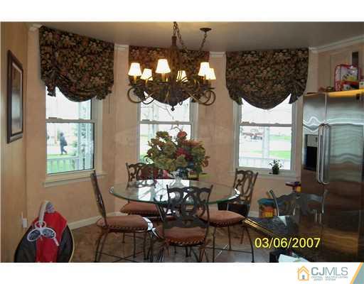 1669 Union Avenue, Unit NONE Hazlet, NJ 07730 - Photo 3 of 10 a living room with furniture