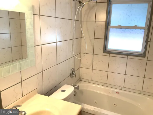 a bathroom with a bathtub