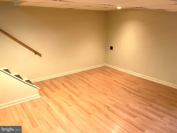 a bedroom with a bed and a fireplace