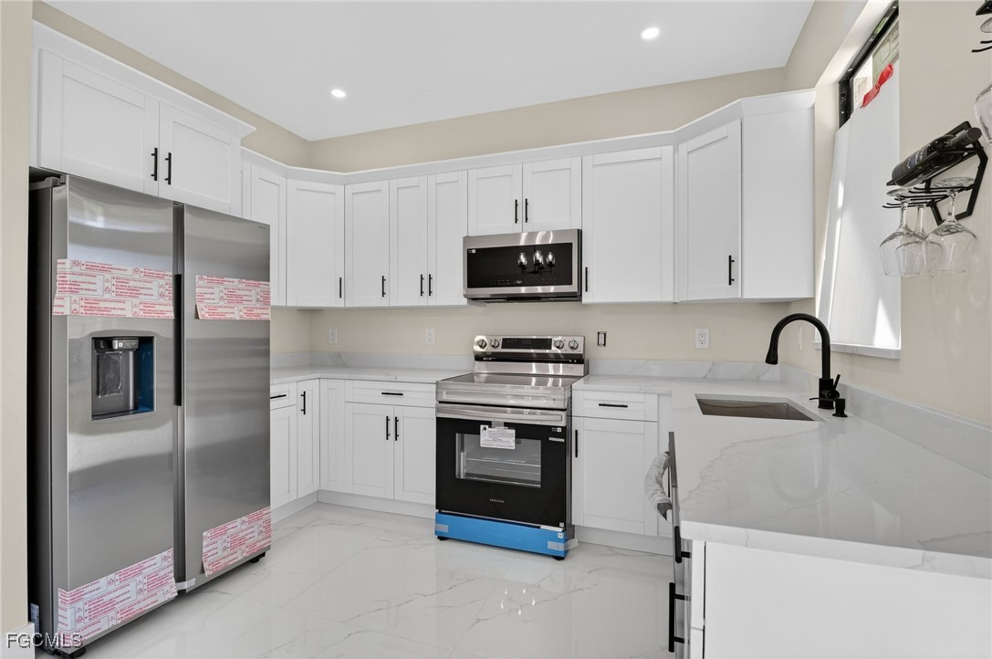 3207 40th Street West Lehigh Acres, FL 33971 - Photo 6 of 48