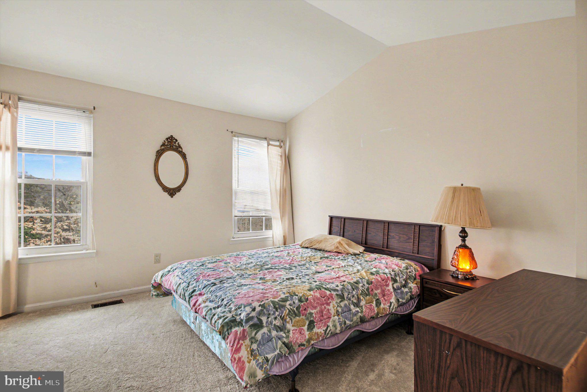 211 Wind Ridge Drive Stafford, VA 22554 - Photo 16 of 27 a bedroom with a bed and window