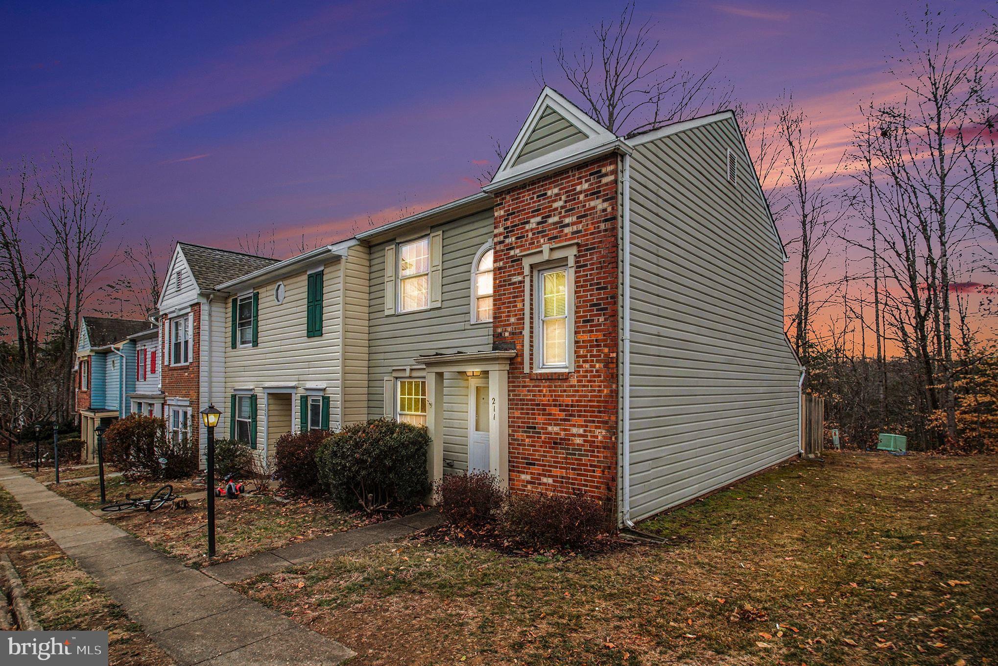 211 Wind Ridge Drive Stafford, VA 22554 - Photo 2 of 27 a view of a house with backyard and sitting area