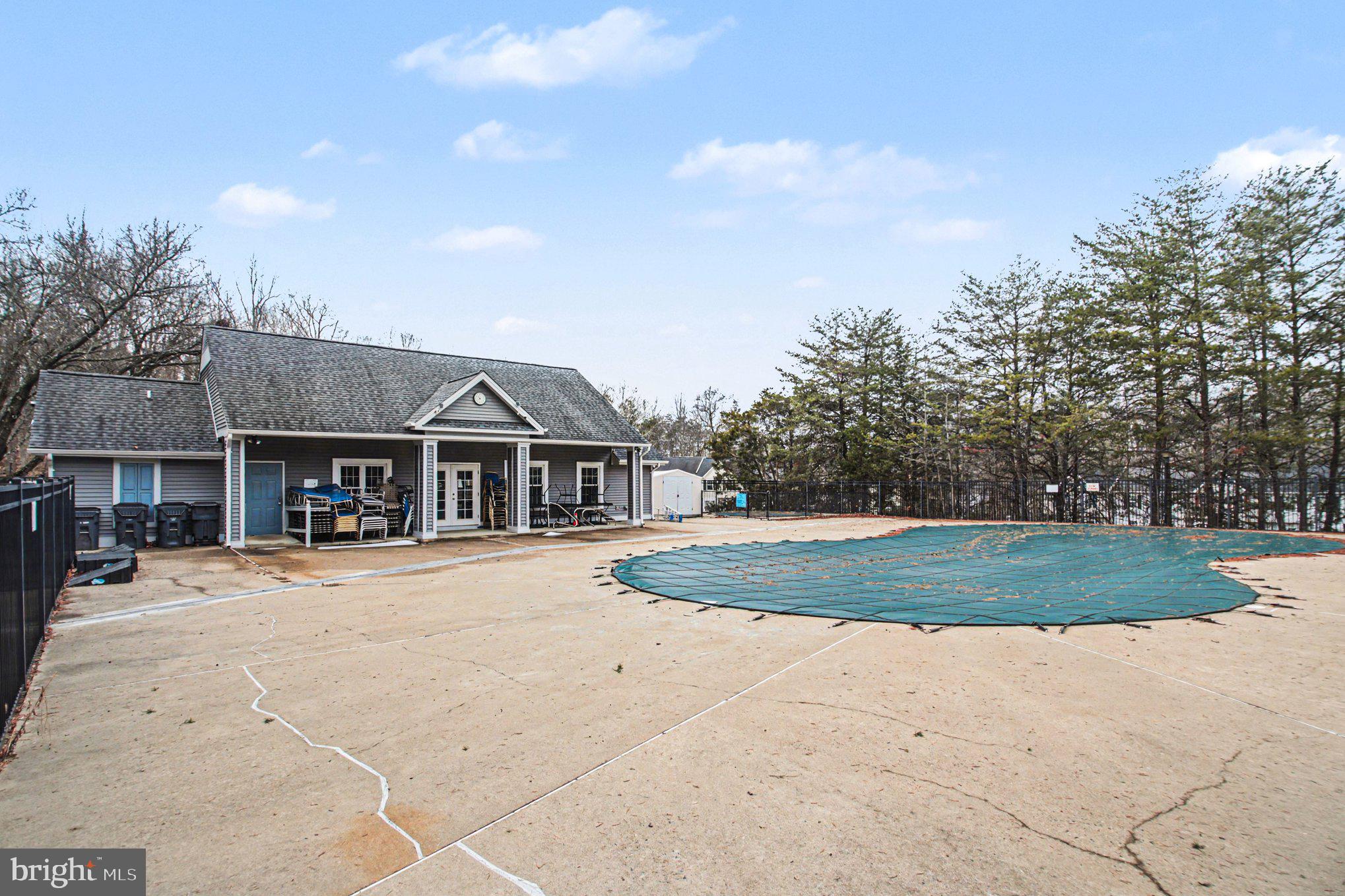 211 Wind Ridge Drive Stafford, VA 22554 - Photo 27 of 27 a front view of a house with a yard