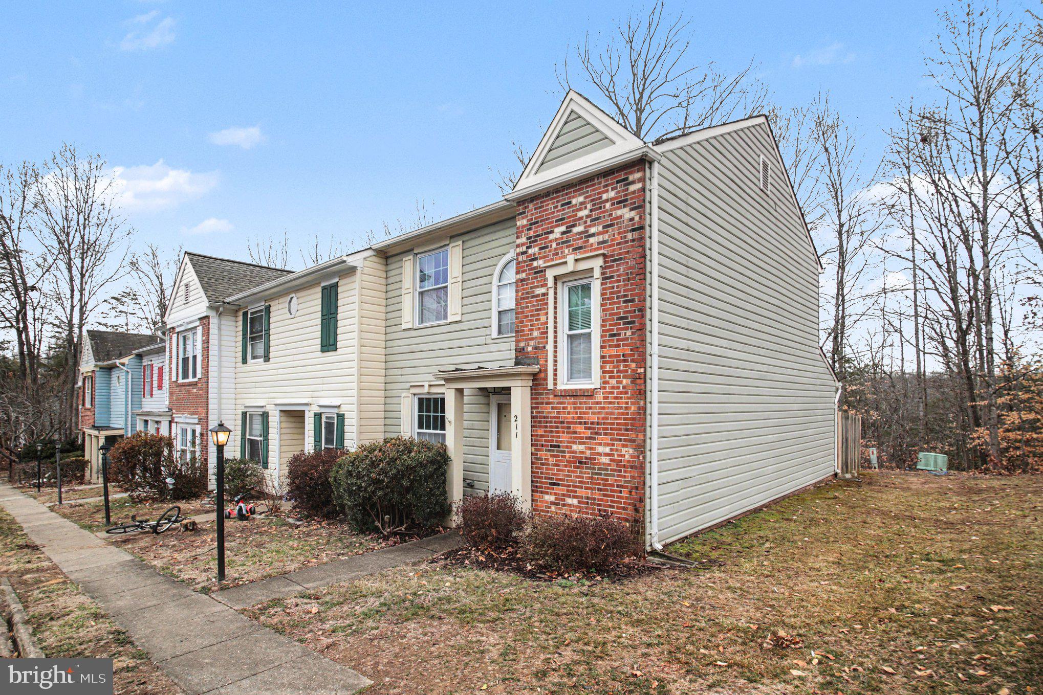 211 Wind Ridge Drive Stafford, VA 22554 - Photo 3 of 27 a view of a house with a yard
