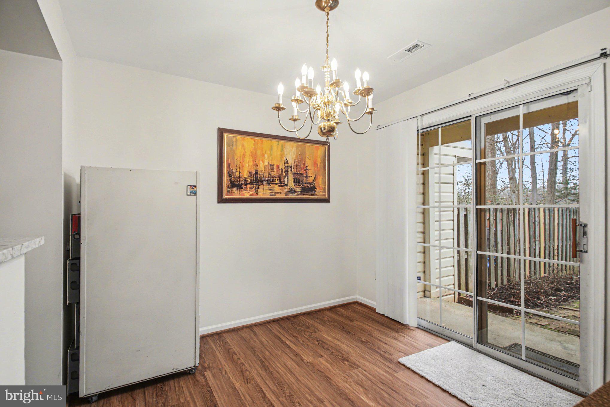 211 Wind Ridge Drive Stafford, VA 22554 - Photo 8 of 27 a view of a room with wooden floor and balcony