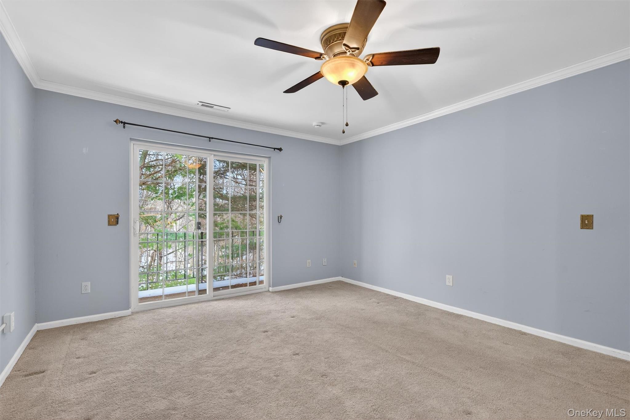 276 Temple Hill Road, Unit 2604 New Windsor, NY 12553 - Photo 20 of 31 an empty room with a ceiling fan and window