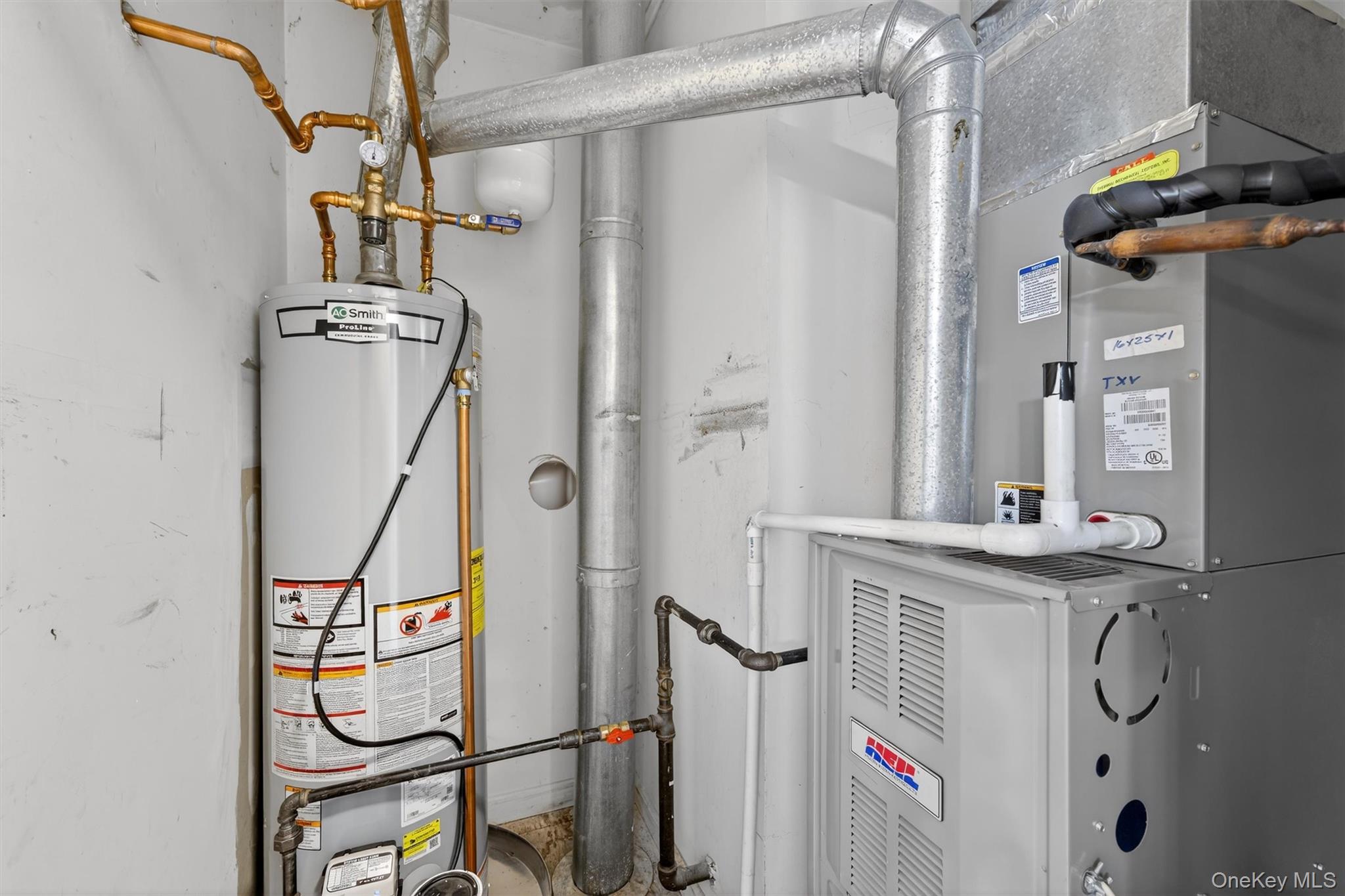 276 Temple Hill Road, Unit 2604 New Windsor, NY 12553 - Photo 22 of 31 a utility room with dryer and washer
