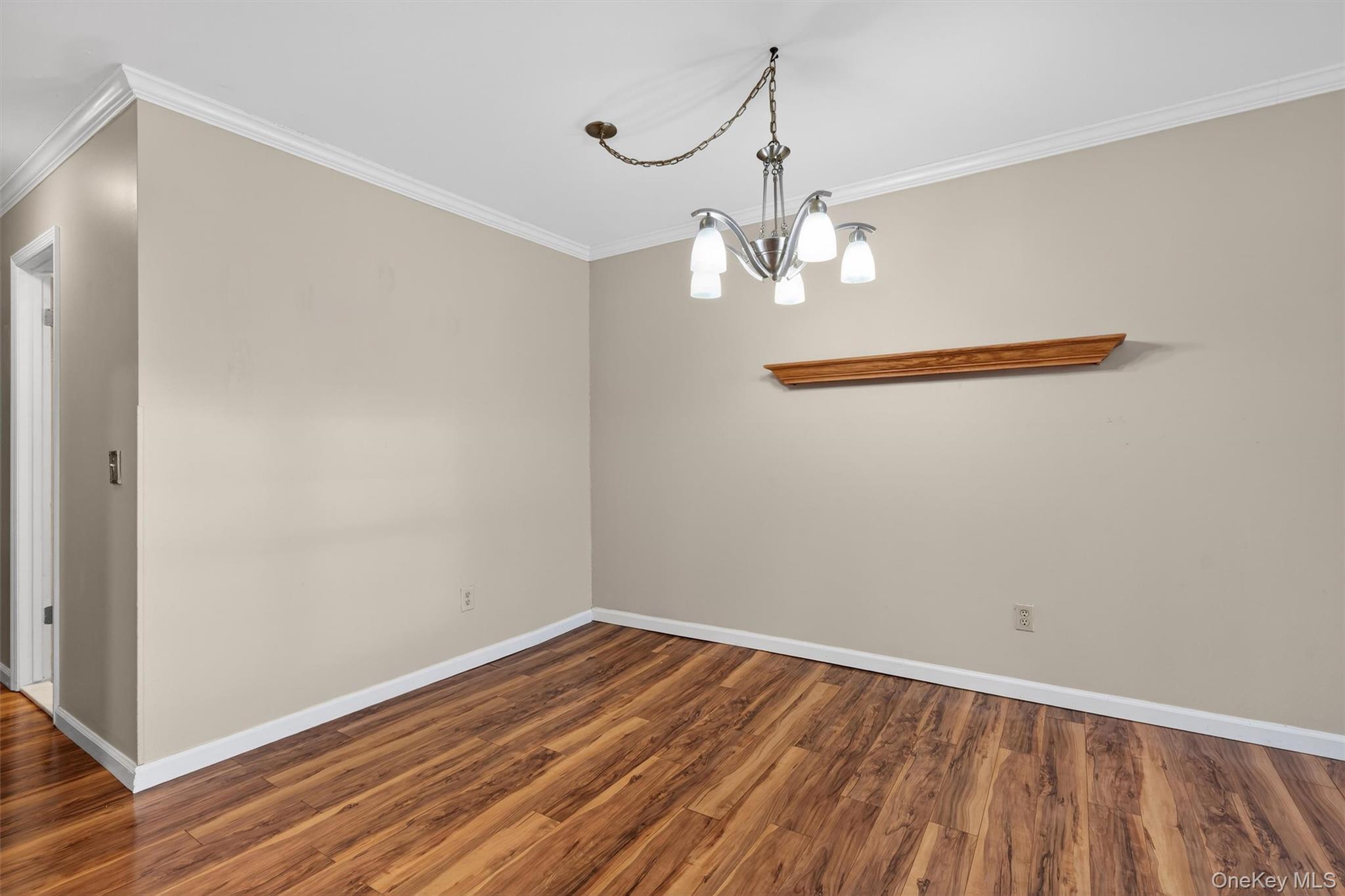 276 Temple Hill Road, Unit 2604 New Windsor, NY 12553 - Photo 6 of 31 a view of a room with wooden floor fan and a window