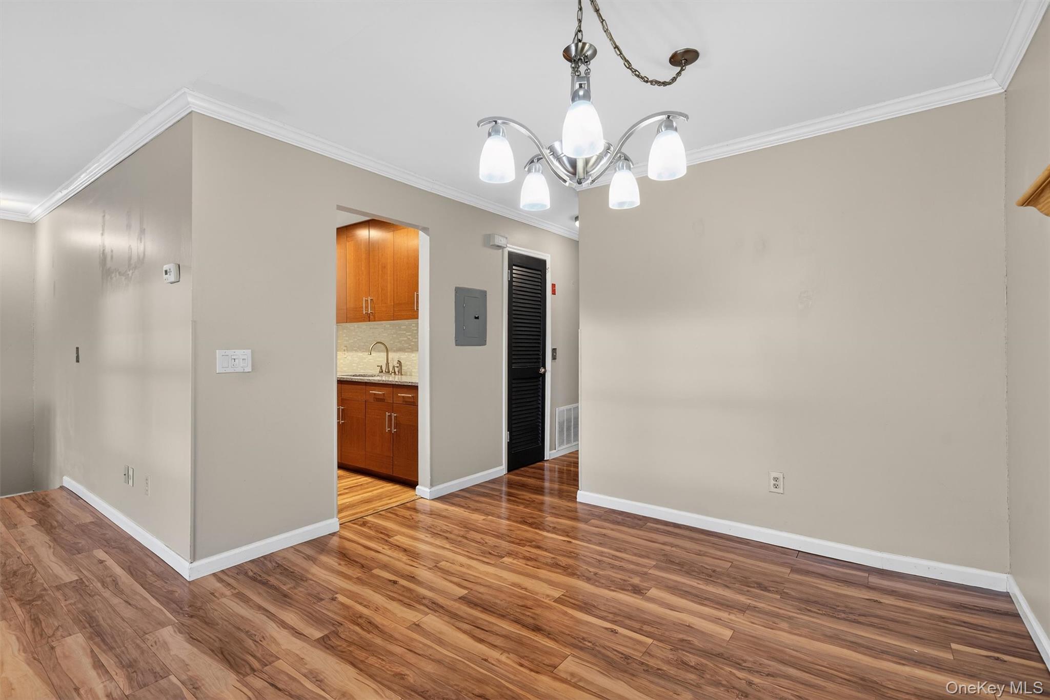 276 Temple Hill Road, Unit 2604 New Windsor, NY 12553 - Photo 8 of 31 a view of a livingroom with wooden floor