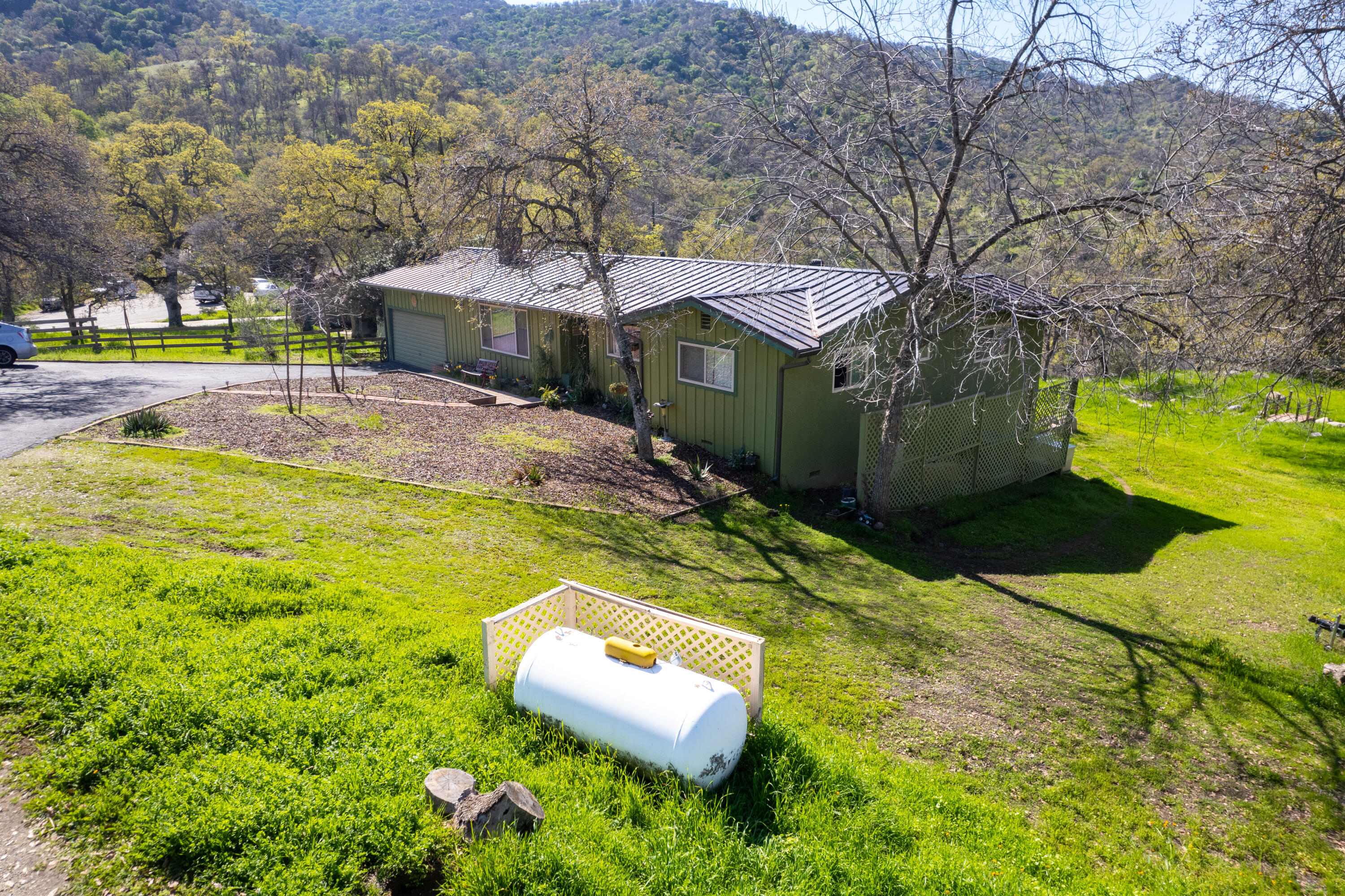 44040 Skyline Drive Three Rivers, CA 93271 - Photo 4 of 40 a view of a swimming pool with a patio