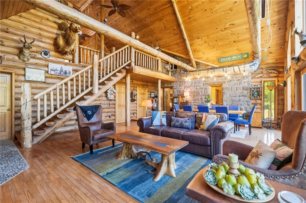 128 Courson Lane Emlenton, PA 16373 - Photo 16 of 50 a living room with furniture a rug and a table