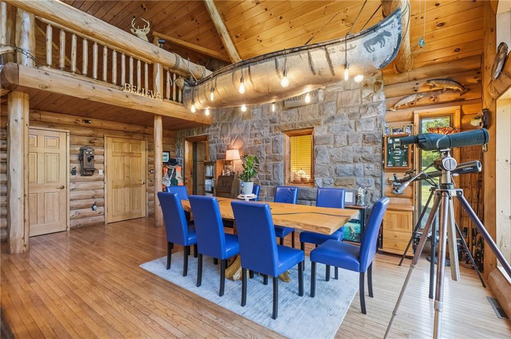 128 Courson Lane Emlenton, PA 16373 - Photo 18 of 50 a view of a dining room with furniture and wooden floor