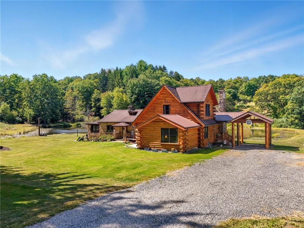 128 Courson Lane Emlenton, PA 16373 - Photo 2 of 50 a front view of house with yard