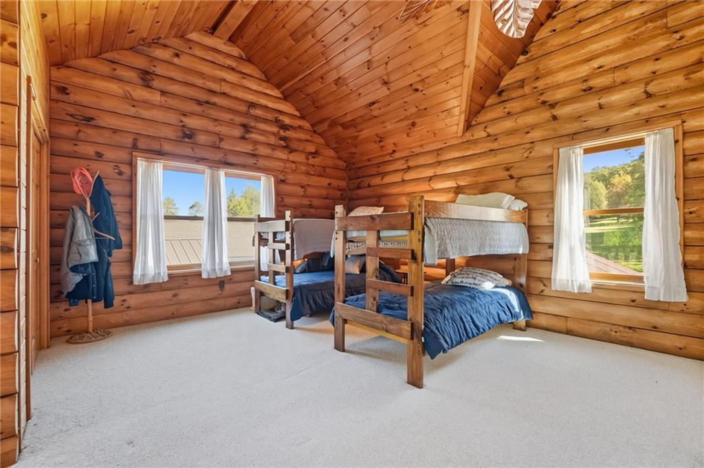 128 Courson Lane Emlenton, PA 16373 - Photo 31 of 50 a bed room with furniture and a window