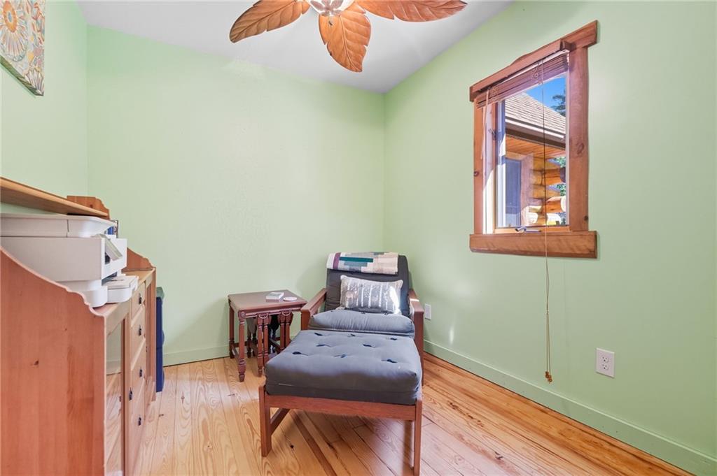 128 Courson Lane Emlenton, PA 16373 - Photo 33 of 50 a room with furniture and wooden floor