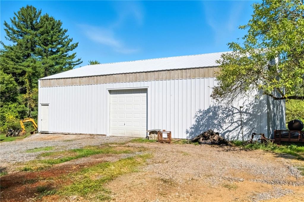 128 Courson Lane Emlenton, PA 16373 - Photo 45 of 50 a view of a house with a yard
